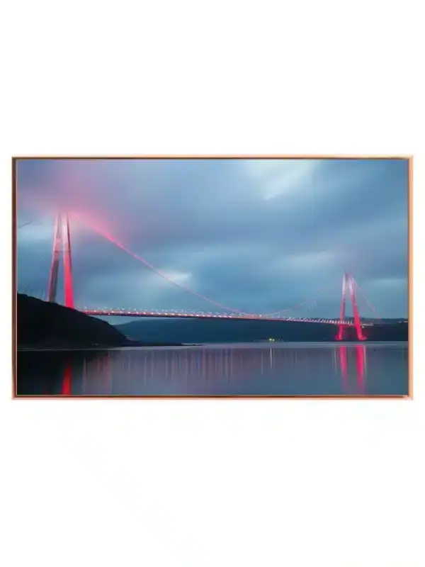 Illuminated Suspension Bridge At Dusk