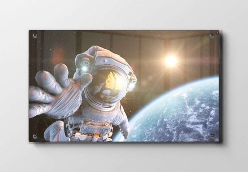 Astronaut Over Jorden i Sollys